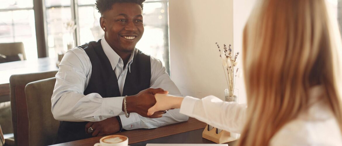 man iand woman doing a handshake